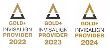The image displays a series of four logos, each with the word INVISALIGN prominently featured, alongside different icons and text that represent various levels of service or product offerings. These include GOLD, PLATINUM, DIAMOND, and INVISALIGN PROVIDER. The logos are arranged in a horizontal row against a light background, with each logo having a unique design element such as color and symbolic of the tier it represents.